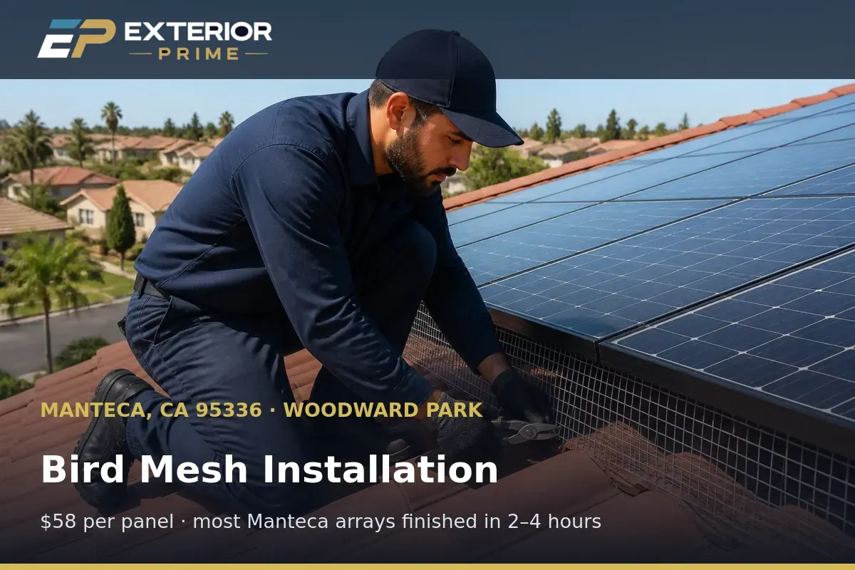 Bird mesh installation in progress along a rooftop solar array on a Manteca, CA home, panel frame clips visible