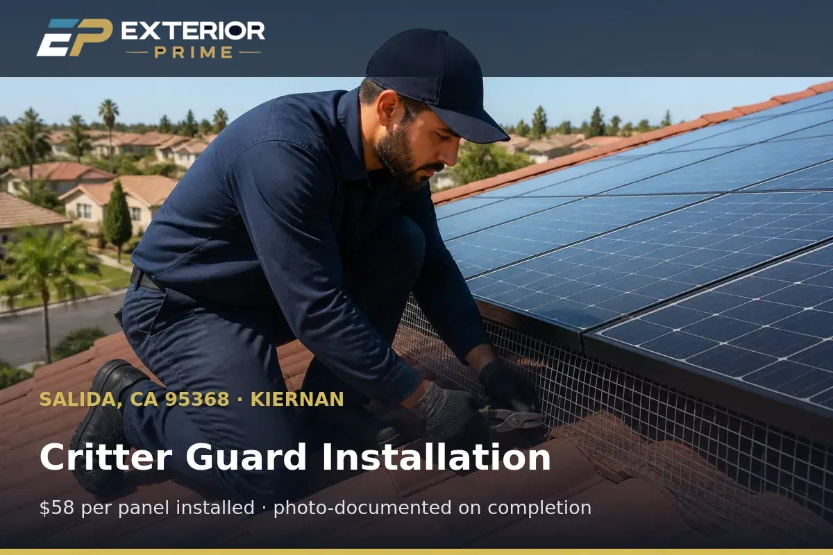 Exterior Prime professional securing critter guard mesh to a module frame on a Kiernan-area roof in Salida, CA