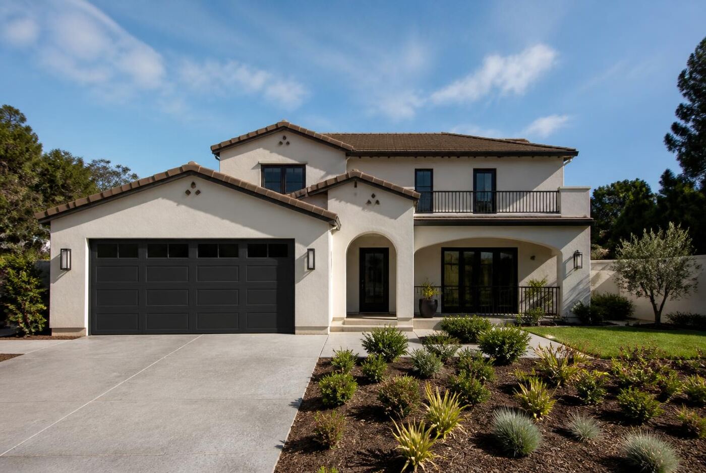 Daytime view of a two-story stucco home where the permanent lighting track is nearly invisible under the fascia
